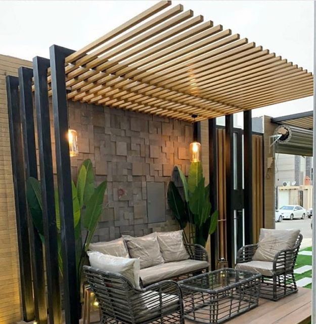Slatted timber pergola with outdoor lounge furniture