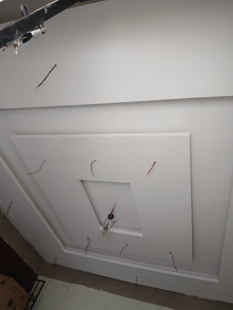 Finished plasterboard ceiling with cove LED lighting